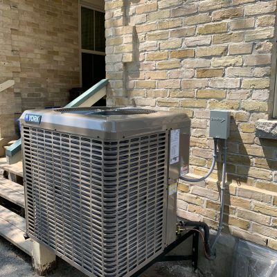 Prologic Comfort Solutions air conditioner unit installed on wall