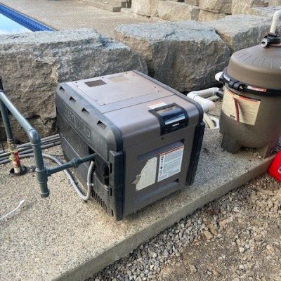 A pool heater unit likely used for heating swimming pools