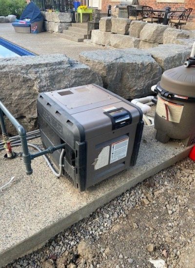 A pool heater unit likely used for heating swimming pools